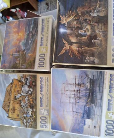 Image 1 of Various unopened 500/1000 piece puzzles