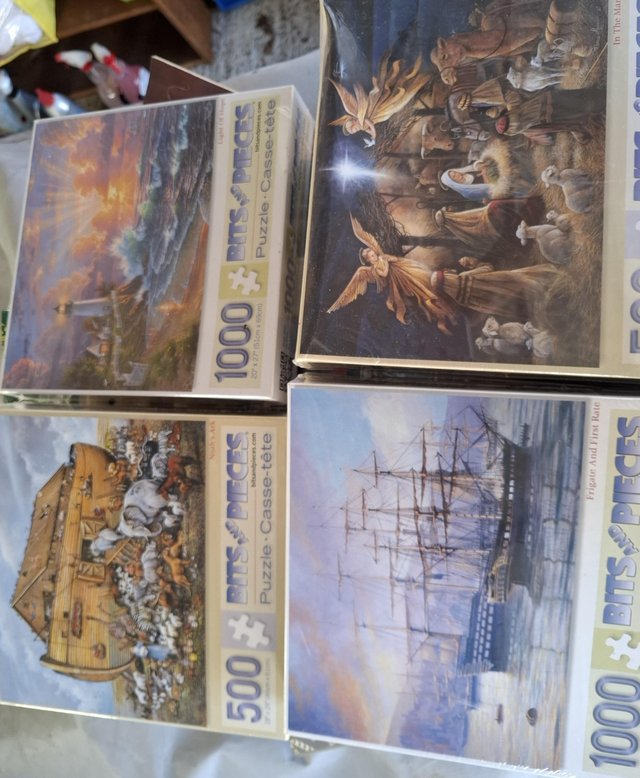 Preview of the first image of Various unopened 500/1000 piece puzzles.