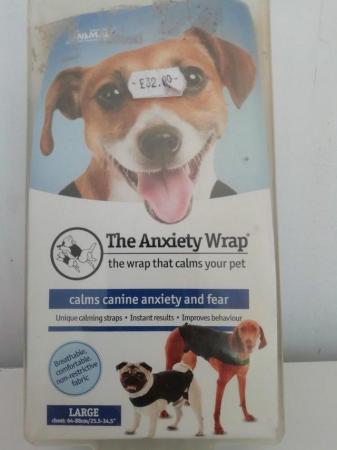 Image 3 of dog anxiety wrap will confirm size