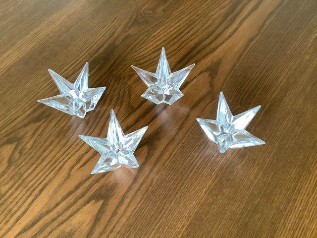Preview of the first image of 4 Glass Star Candle Holders7 cm (W) x 5 cm (H) Used..