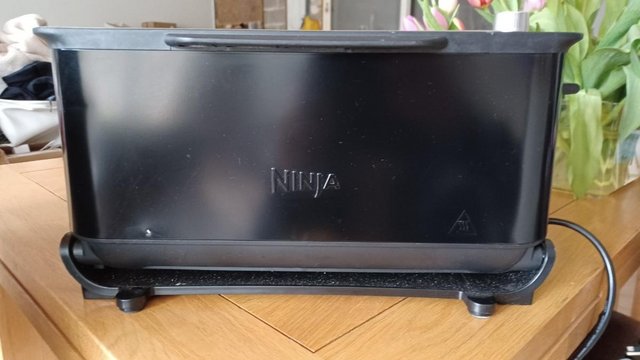 Preview of the first image of Ninja ST100UK 2 in 1 Toaster/Grill unused but missing grill.