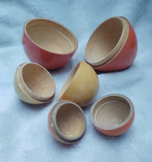 Preview of the first image of Wooden Vintage Three Nesting Eggs.
