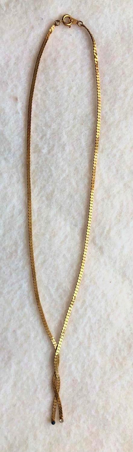 Preview of the first image of NEW NECKLACE WITH CROSS OVER DETAIL.
