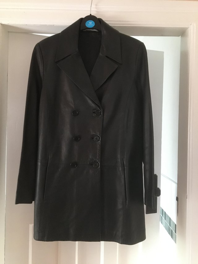Preview of the first image of A Marks & Spencer ladies soft black leather coat..