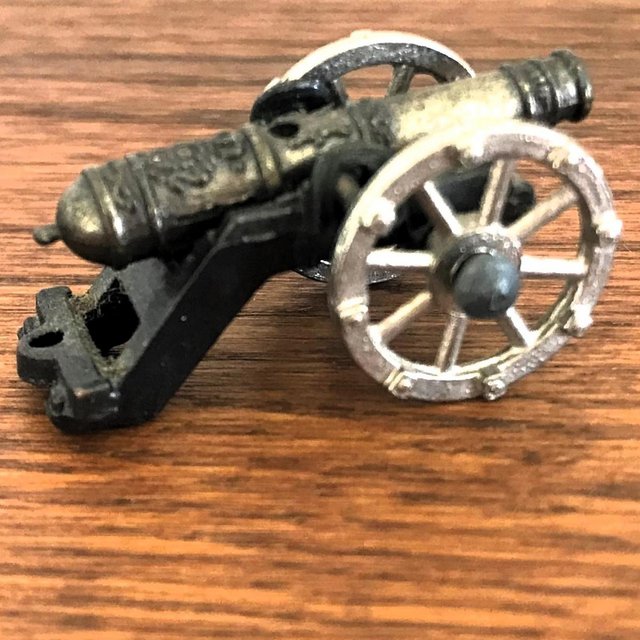 Preview of the first image of Vintage 1980/90's small metal cannon model, toy, figure..