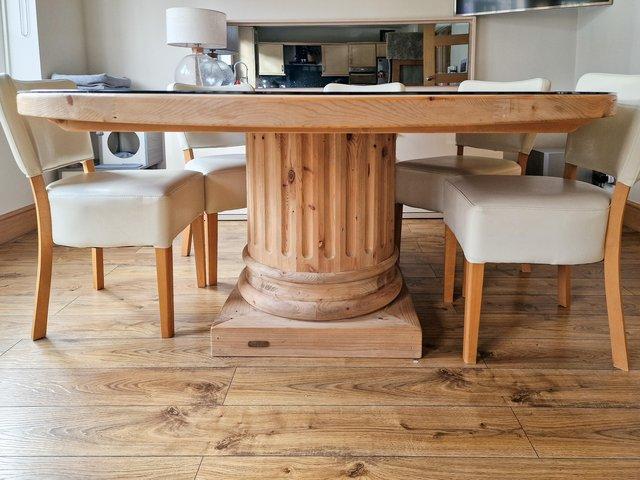 Preview of the first image of Large Column Dining Table Set.