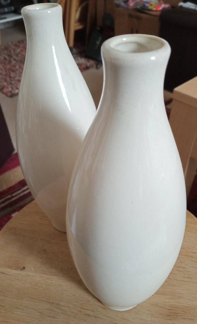 Preview of the first image of Pair of cream ceramic vases.