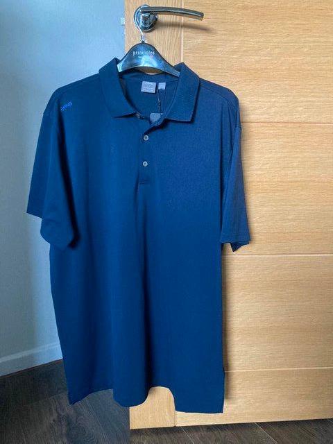 Preview of the first image of Men's Golf Top Size XL brand new with tags.