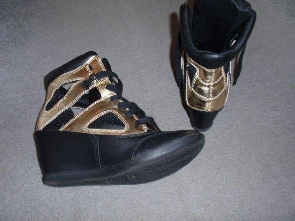 Image 3 of Black and Gold Wedge Trainers from Forever 21