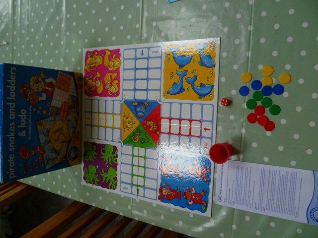 Preview of the first image of Orchard Toys Snakes & Ladders & Ludo Game.