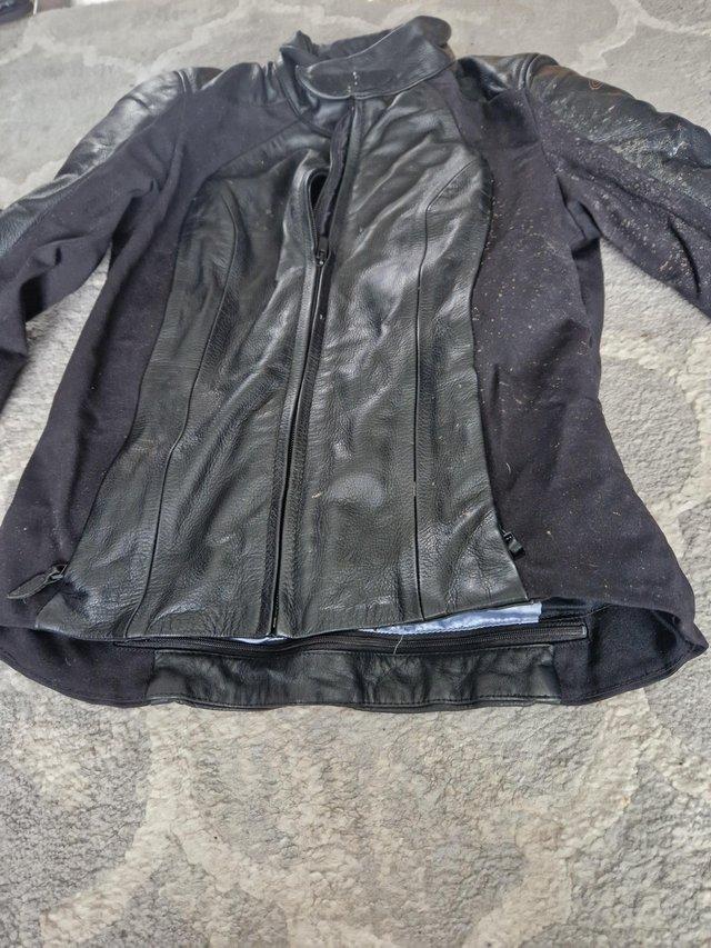 Preview of the first image of Ladies motorbike leather jacket  small size 12.