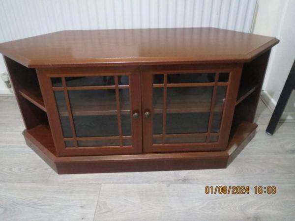 Image 1 of TV Stand cabinet with shelves.