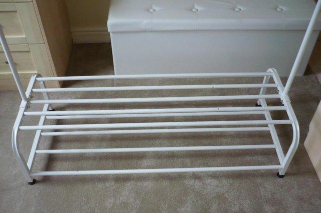Image 2 of Clothes rack with bottom storage space