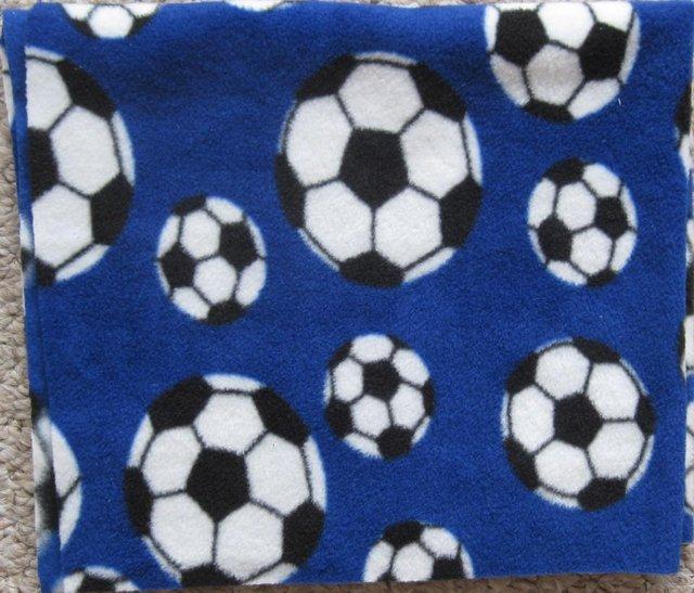 Preview of the first image of Fleecy Fabric/material - Football design.
