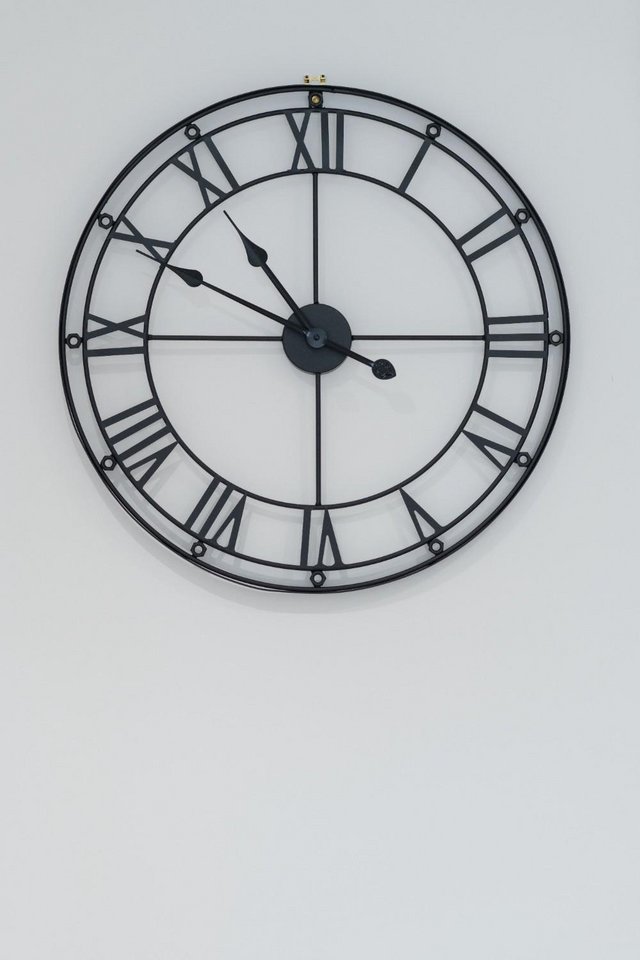 Preview of the first image of Large black metal wall clock.