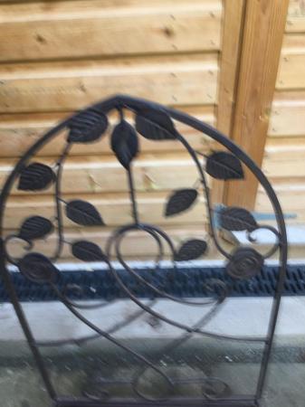 Image 1 of An attractive metal wall trough with leaf and those design.