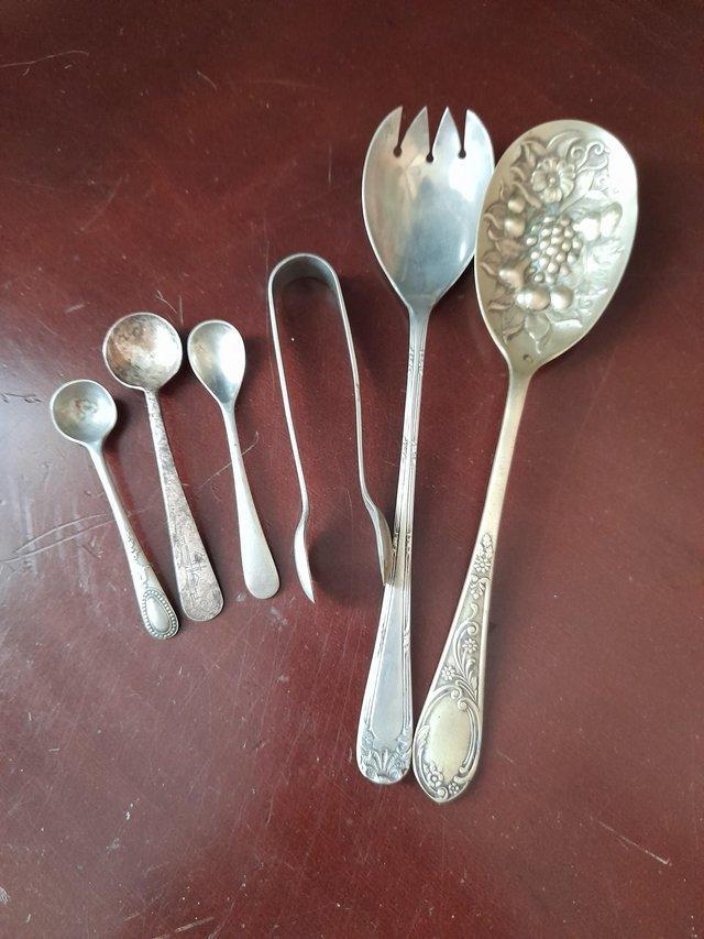 Preview of the first image of Vintage spoons and art glass piece.