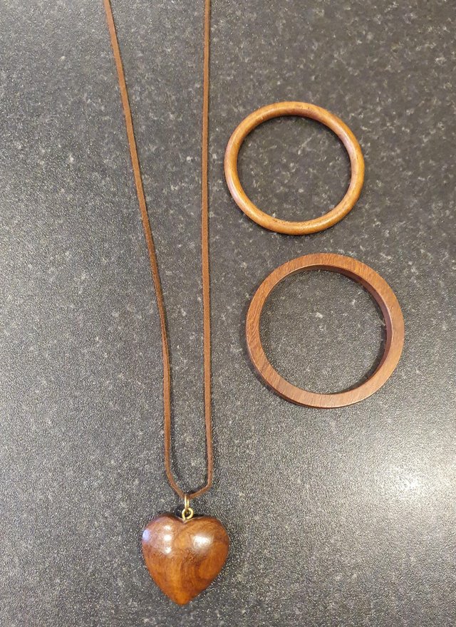 Preview of the first image of Wooden heart necklace and 2 wooden bangles.