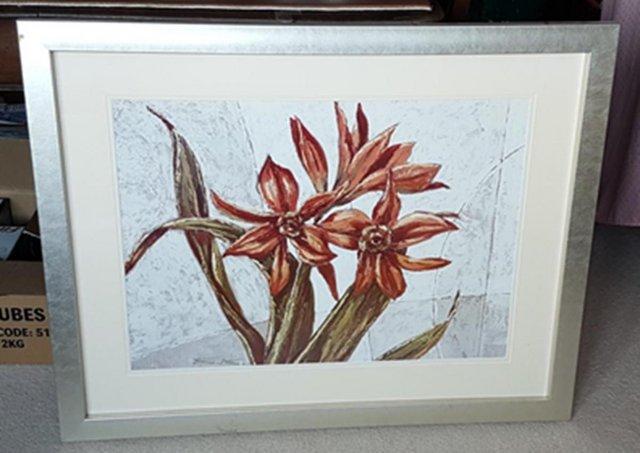 Preview of the first image of Large print in silver coloured frame, modern red flowers.