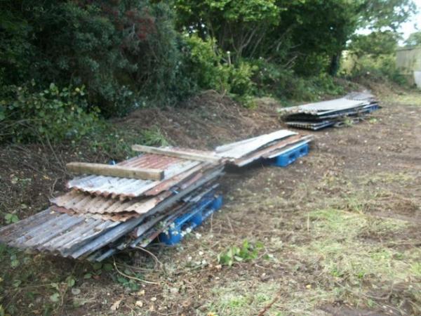 Image 3 of plastic pallets, soakaway decking,log store,awning,