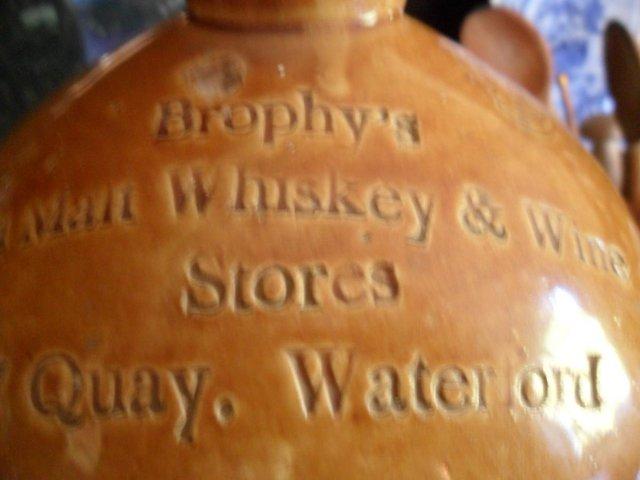 Preview of the first image of Two ironstone flagons, 1 from Brophy's Whiskey & Wine Stores.