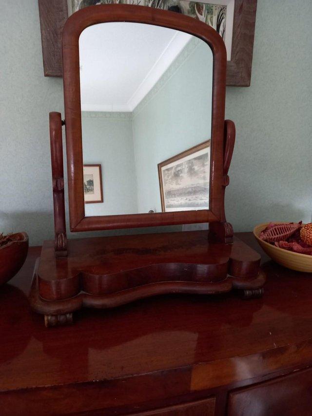 Preview of the first image of Antique Victorian mahogany mantle mirror.
