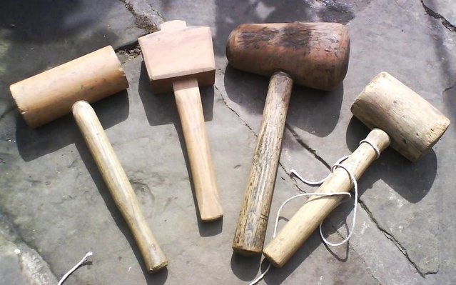 Preview of the first image of 4 Mallets wood. vintage used.  for wall display etc old carp.