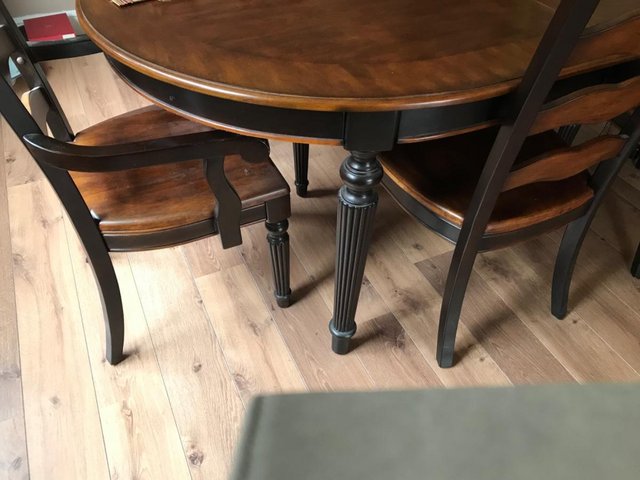 Preview of the first image of Dining table and six chairs.
