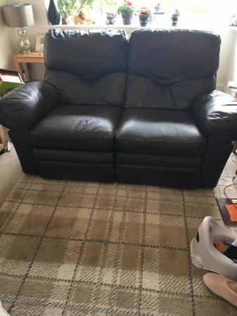 Image 2 of 2 leather sofas they are both recliners but one needs 2 cabl