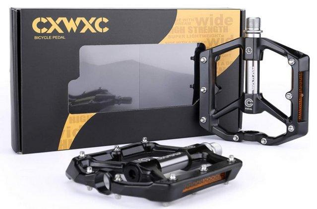 Preview of the first image of CXWXC Bicycle pedals, black and silver colour..