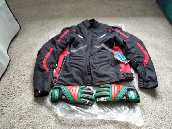 Image 1 of Motorcycle jacket and gloves.