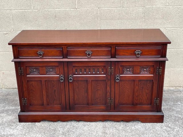 Preview of the first image of OLD CHARM TUDOR BROWN SIDEBOARD DRESSER BASE CUPBOARD UNIT.