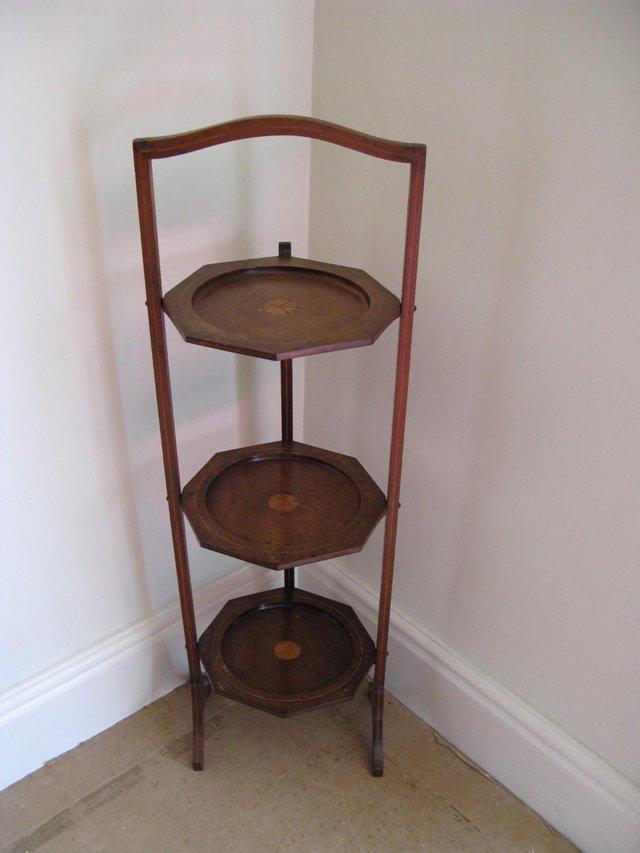 Preview of the first image of Mahogany Antique Folding Cake Stand.