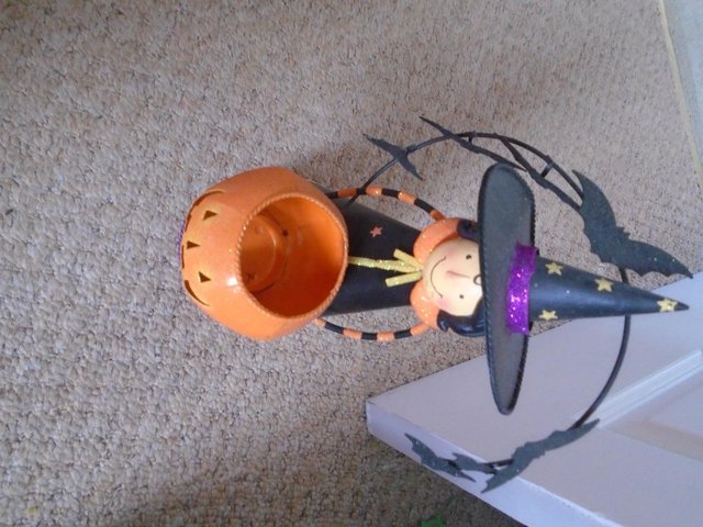 Preview of the first image of Partylite Abracadabra witch candle holder.