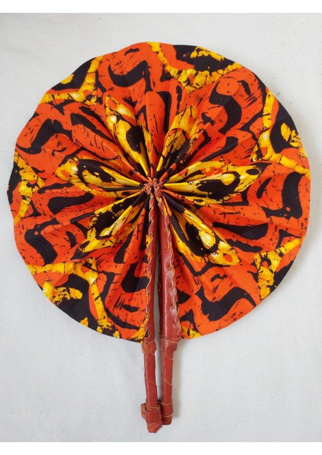 Preview of the first image of Unique handmade orange fan / accessory with african fabrics.