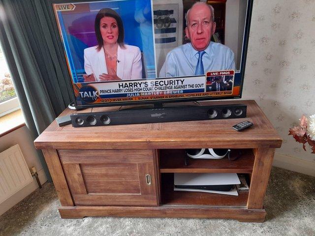 Preview of the first image of DFS tv unit solidwood mahogany.