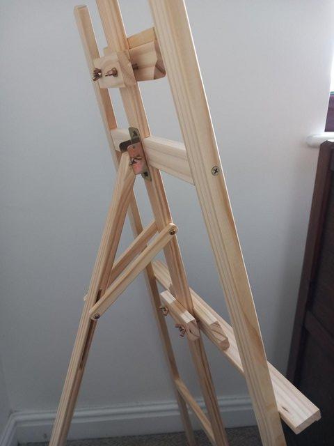 Preview of the first image of NEW. Unused pine easel. Fully adjustable height etc..