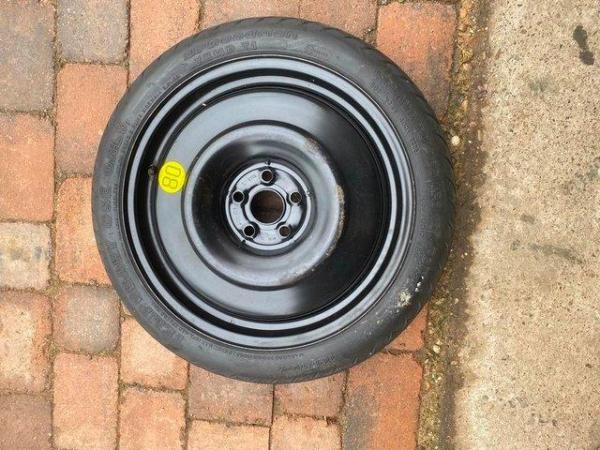 Image 1 of Space saver wheel never been used