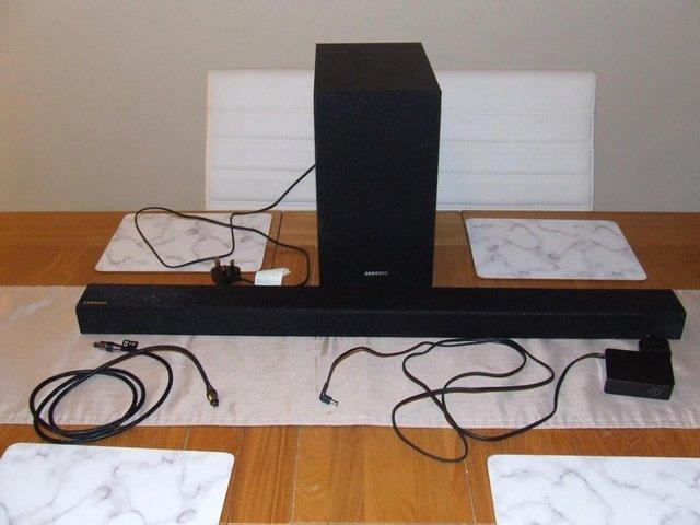 Preview of the first image of Samsung PS-WR45B Subwoofer w/ Soundbar HW-R450 Theatre Home.