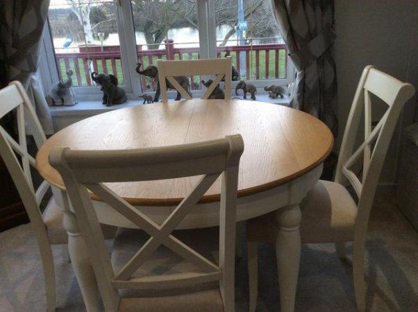 Image 3 of Extending dining table and four chairs
