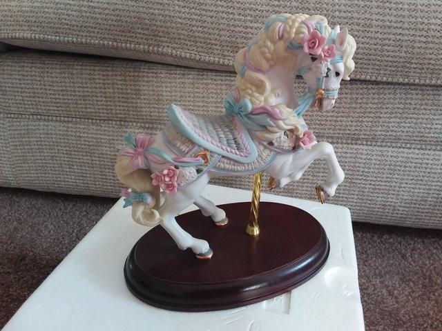 Preview of the first image of FINE BISQUE PORCELAIN CAROUSEL HORSE WITH 24KT GOLD.