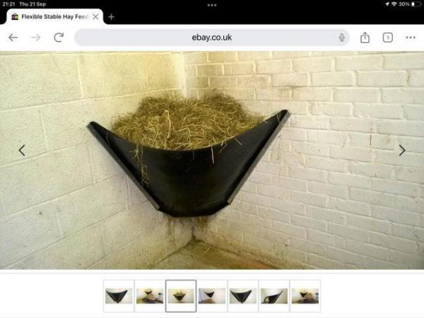 Image 1 of Rubber hay feeder for stable corner