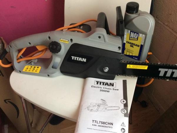 Image 1 of Titan electric Chainsaw used once