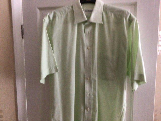 Preview of the first image of Van heusen mint green short sleeved shirt.