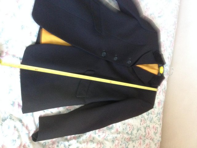 Preview of the first image of Brand New. HORSE RIDING SHOWING JACKET. BLACK..