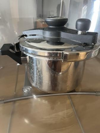 Image 3 of Dual purpose cooking utensil and pressure cooker