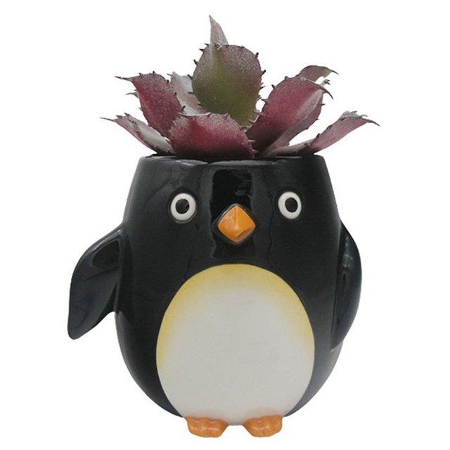 Preview of the first image of Penguin Shaped Ceramic Garden Planter/Plant Pot. Free  post.