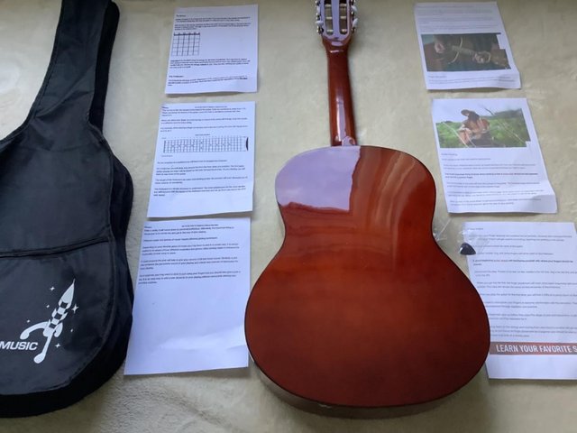 Preview of the first image of CLASSICAL GUITAR WITH GIG BAG.