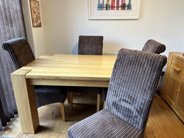 Image 2 of Solid oak dining room table and four chairs
