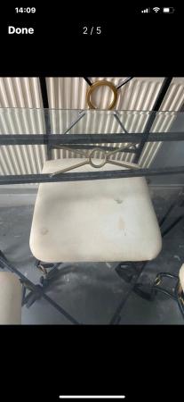 Image 1 of Cast iron table an chairs